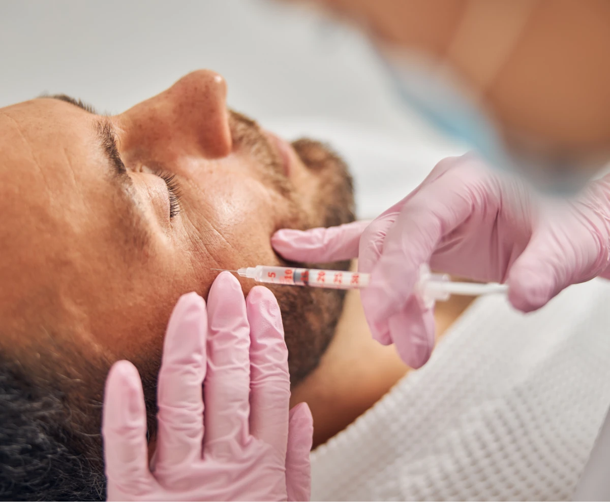 man during injection treatment